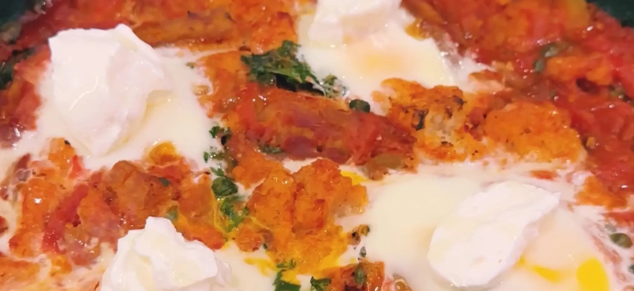 Baked Eggs & Greens in Harissa Tomato Sauce | Louisiana Egg Commission